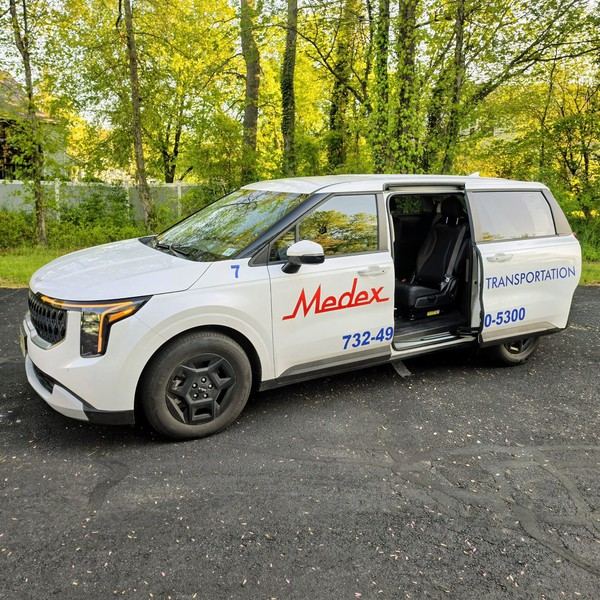 Medex minivan with door open